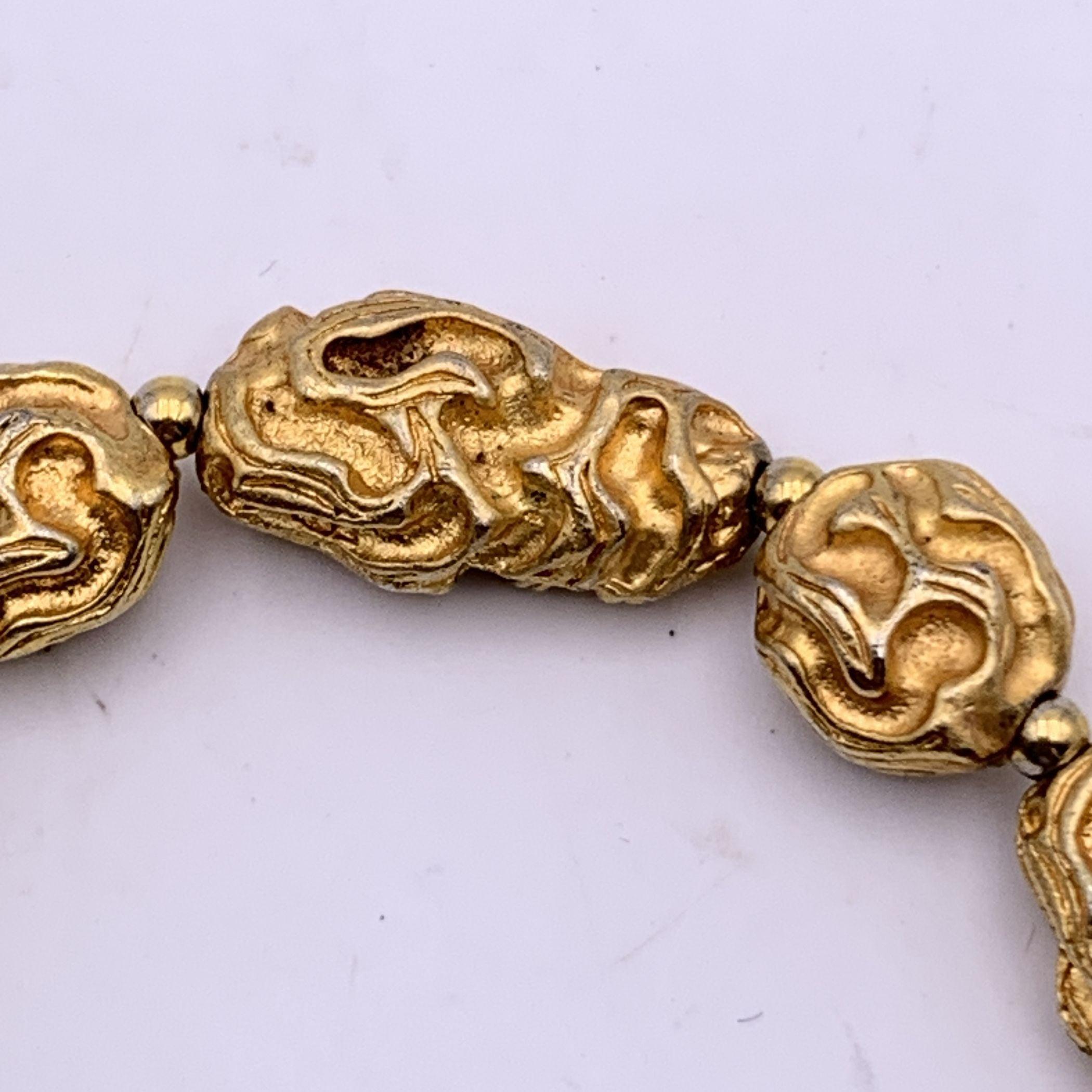 Chanel Vintage 1970s Gold Metal Engraved Pieces Bracelet In Good Condition In Rome, Rome