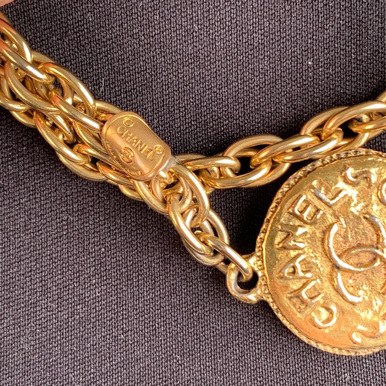 Chanel Vintage 1970s Gold Metal Long Medallion Necklace For Sale at 1stDibs