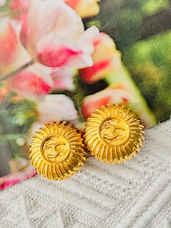 Chanel Vintage 1970s Textured Logo CC Coco Circle Round Sunburst Clip Earrings