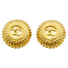 Chanel Vintage 1970s Textured Logo CC Coco Circle Round Sunburst Clip Earrings