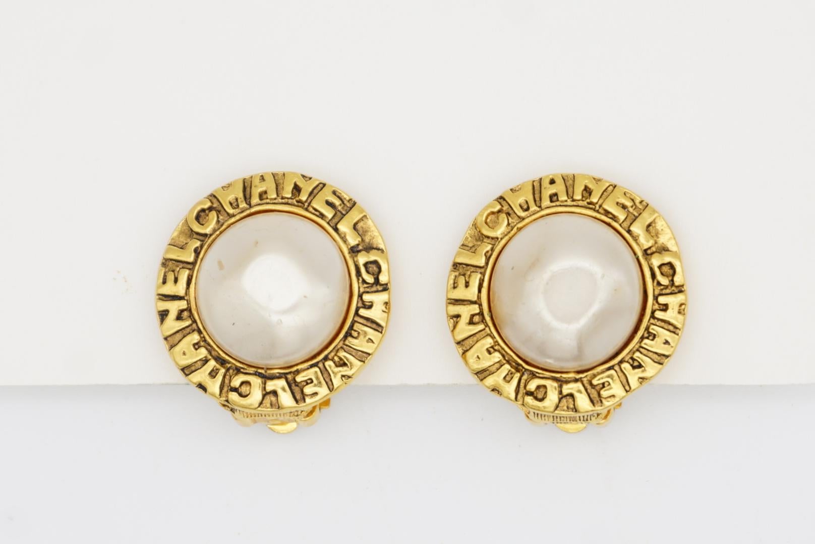 Chanel Vintage 1980s Logo CC Coco Engraved White Pearl Circle Gold Clip Earrings For Sale 2