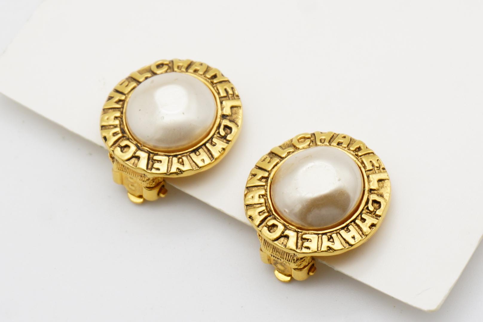 Chanel Vintage 1980s Logo CC Coco Engraved White Pearl Circle Gold Clip Earrings For Sale 3