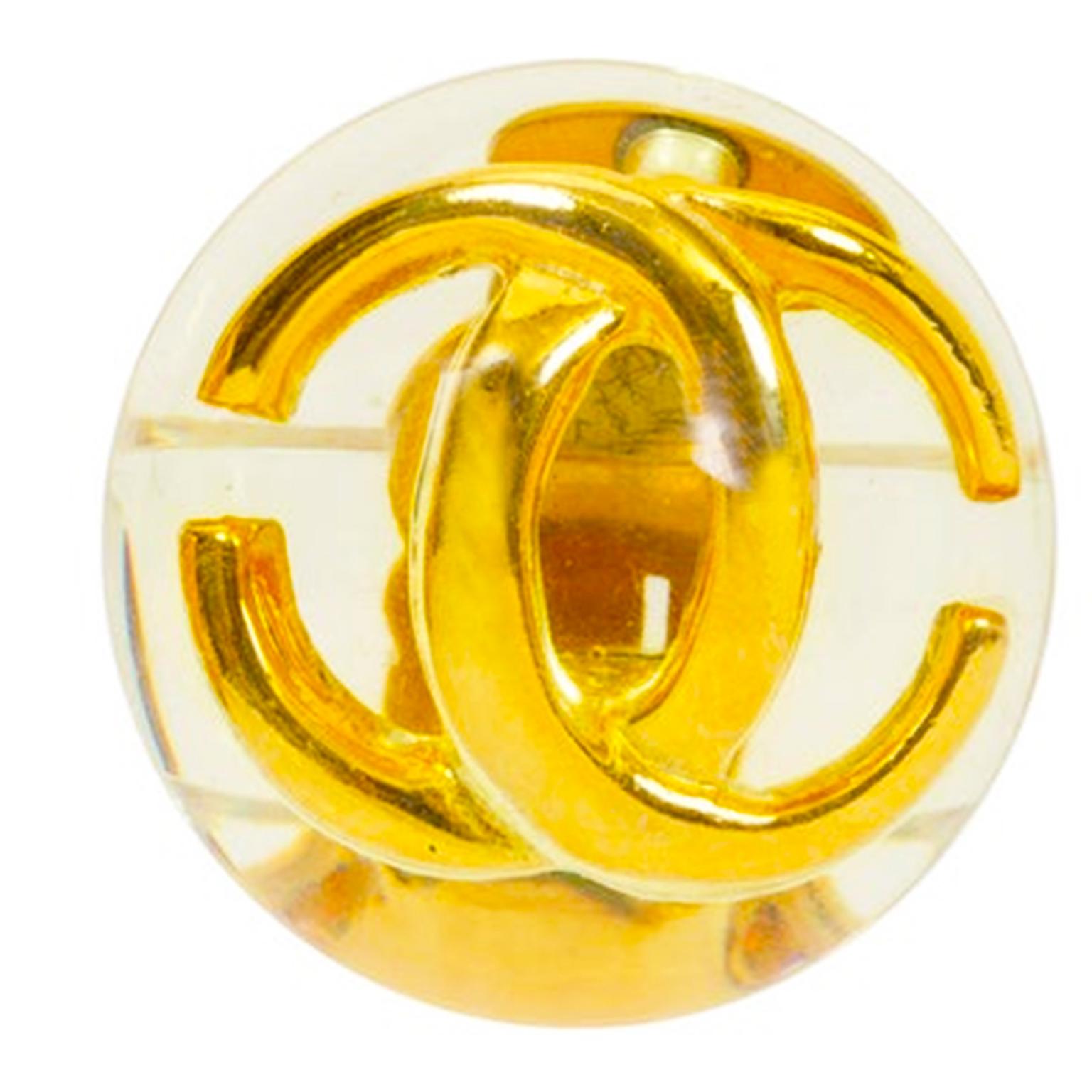 These are stunning vintage 1980's Chanel earrings with lucite domes over gold CC logos. These vintage Chanel Collection 25 by Victoire de Castellane earrings measure 1.5
