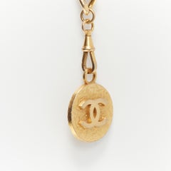 CHANEL Vintage 1982 CC logo coin charm gold tone black leather chain belt