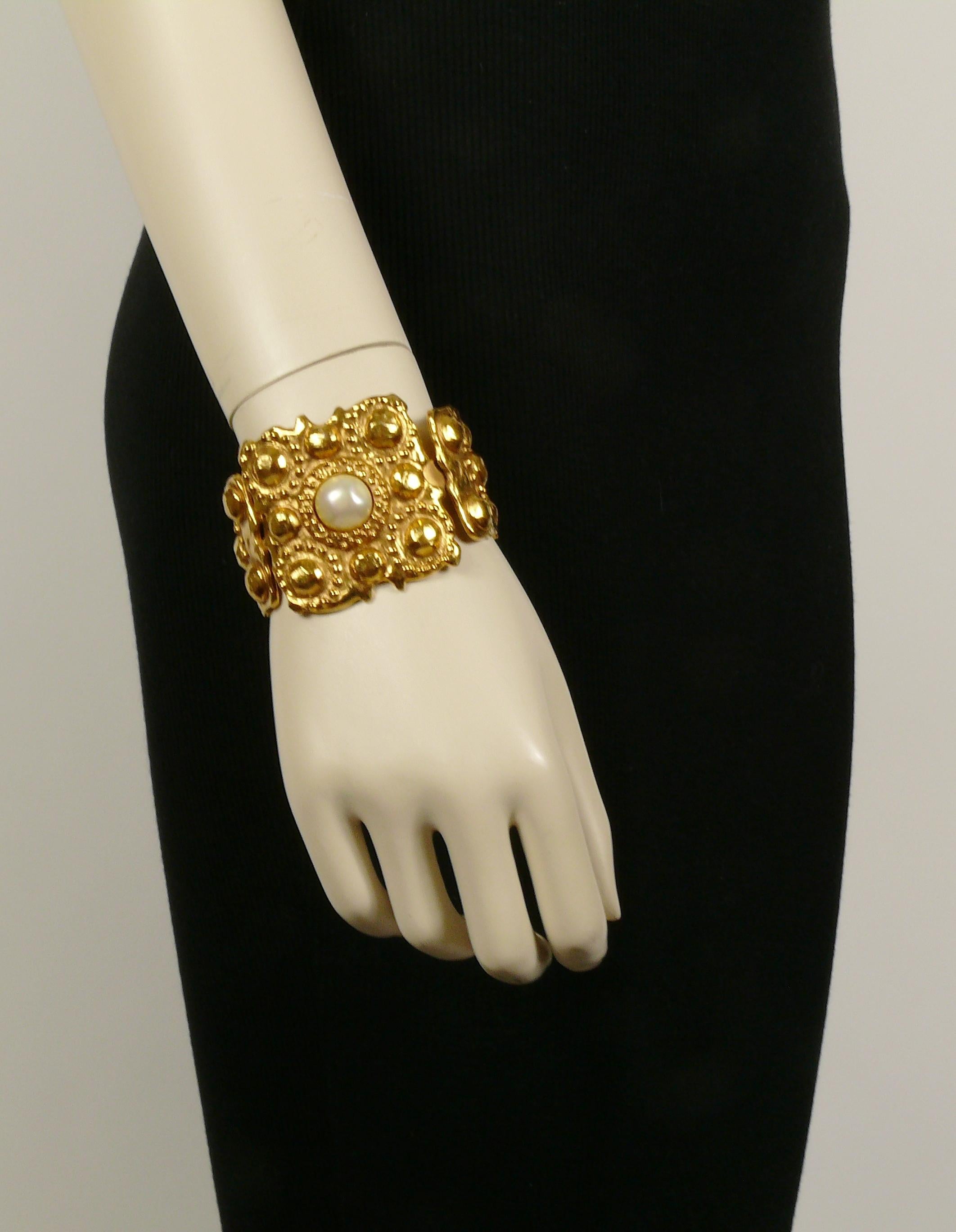 CHANEL vintage Byzantine inspired gold toned bracelet featuring graduated 3 dimensional 