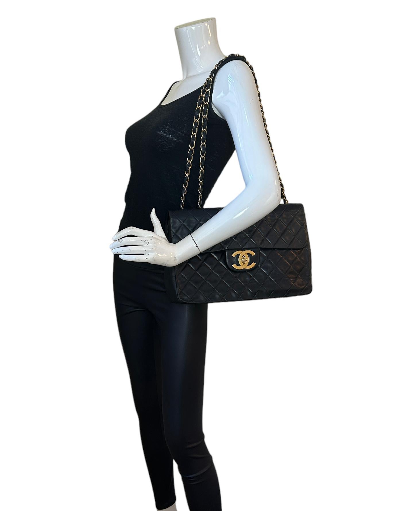Chanel Vintage 1990s Black Lambskin Leather XL Jumbo Flap Bag 

Made In:
Year of Production: 1996-1997
Color: Black
Hardware: Gold plated
Materials: Lambskin leather
Lining: Burgundy smooth leather
Closure/Opening: Flap top with CC