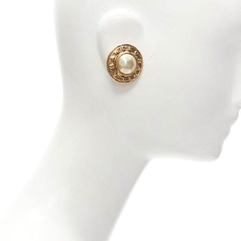 CHANEL Vintage 1990's Collection 26 gold logo faux pearl medallion clip earrings In Excellent Condition In Hong Kong, NT