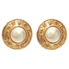 CHANEL Vintage 1990's Collection 26 gold logo faux pearl medallion clip earrings