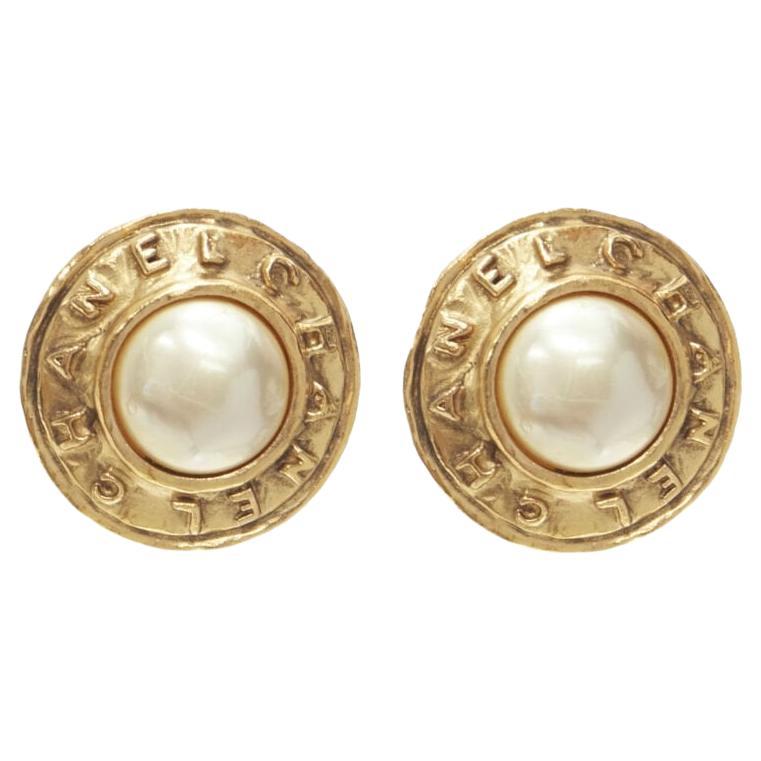 CHANEL Vintage 1990's Collection 26 gold logo faux pearl medallion clip earrings