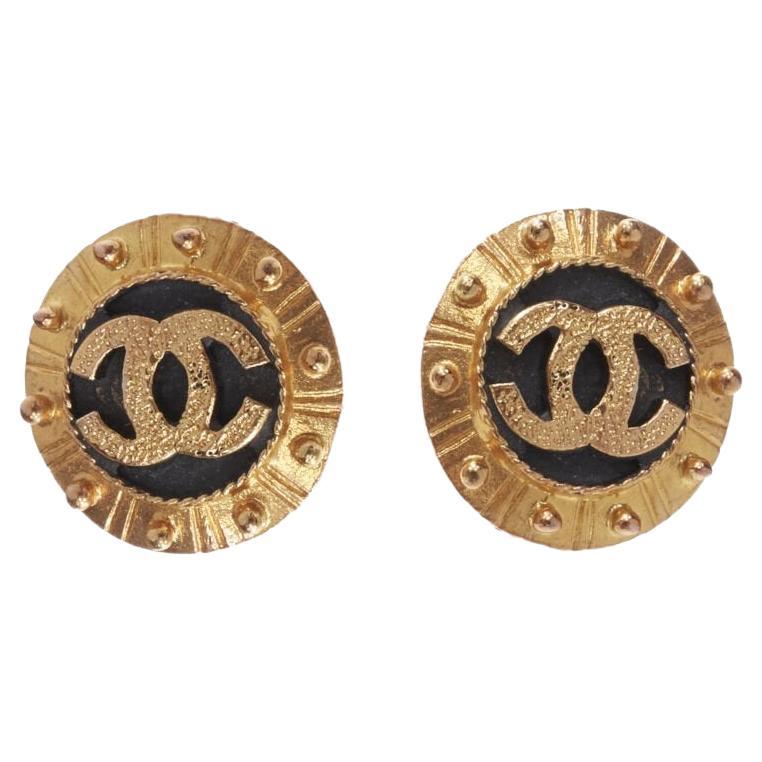 CHANEL Vintage 1990's gold black CC studded clip on earrings For Sale