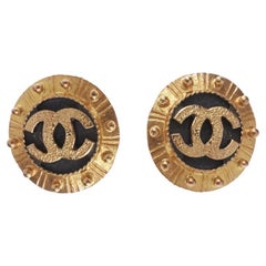 CHANEL Vintage 1990
s gold black CC studded clip on earrings