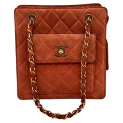Chanel Vintage 1990s Orange Quilted Suede Front Pocket CC Turn-Lock Shoulder Bag