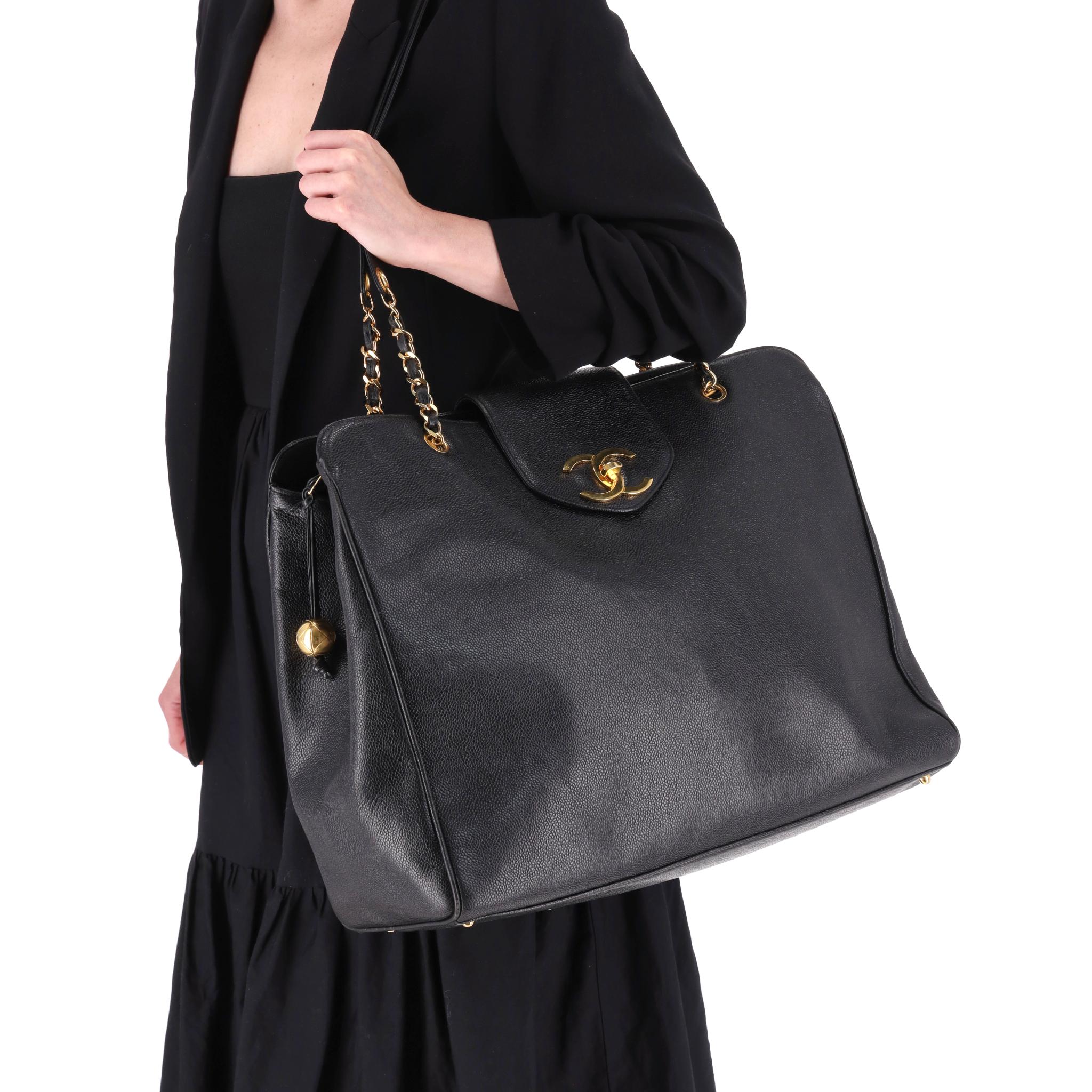 Rare Item - Chanel Supermodel Leather XXL Tote Bag

From 1992 collection, this giant XXL bag is a spacious tote bag that could be used as weekend bag.

Crafted from black caviar-grained calfskin leather with large 'CC' stitched leather logo to the