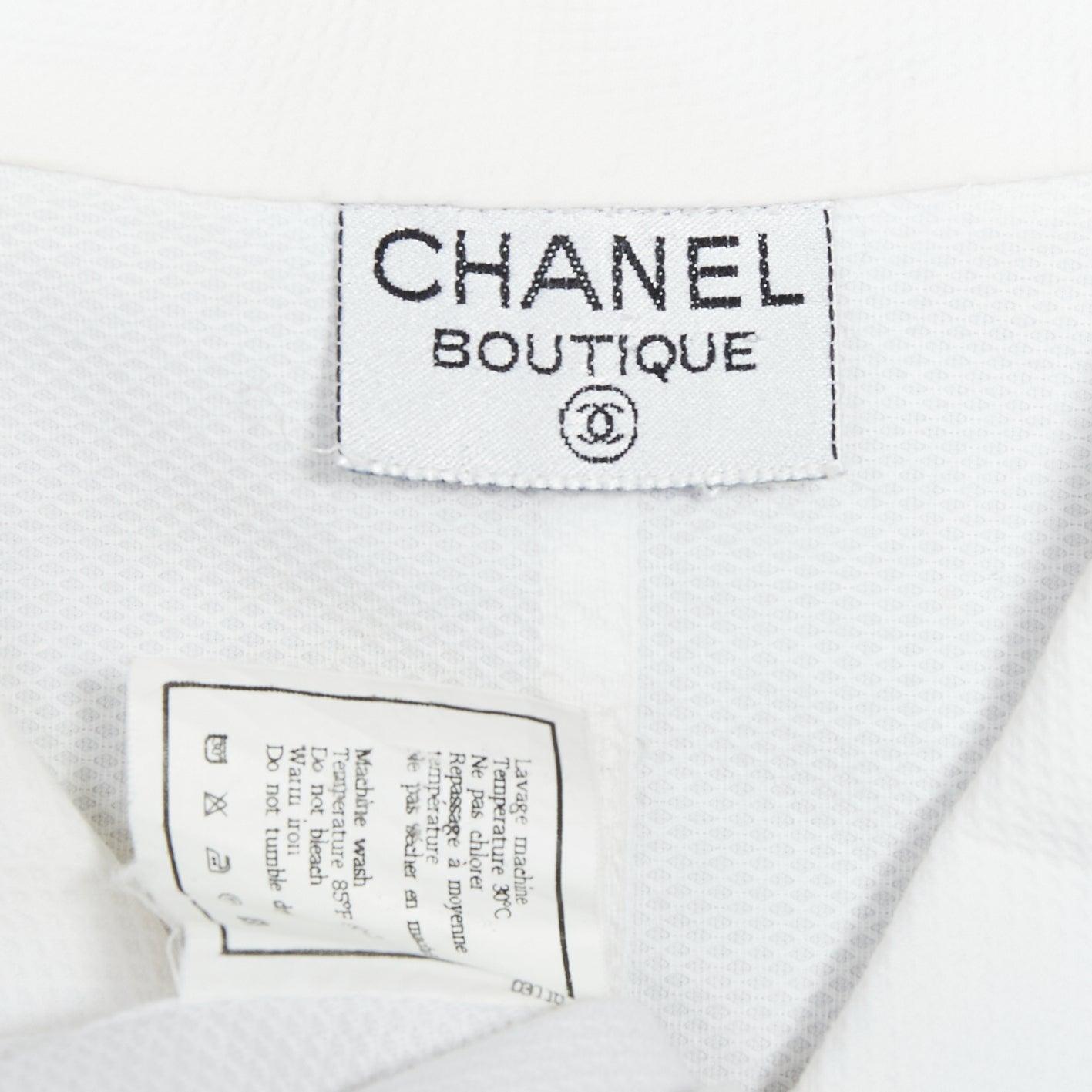 CHANEL Vintage 1990's white cotton gold CC logo button panelled crop shirt For Sale 3