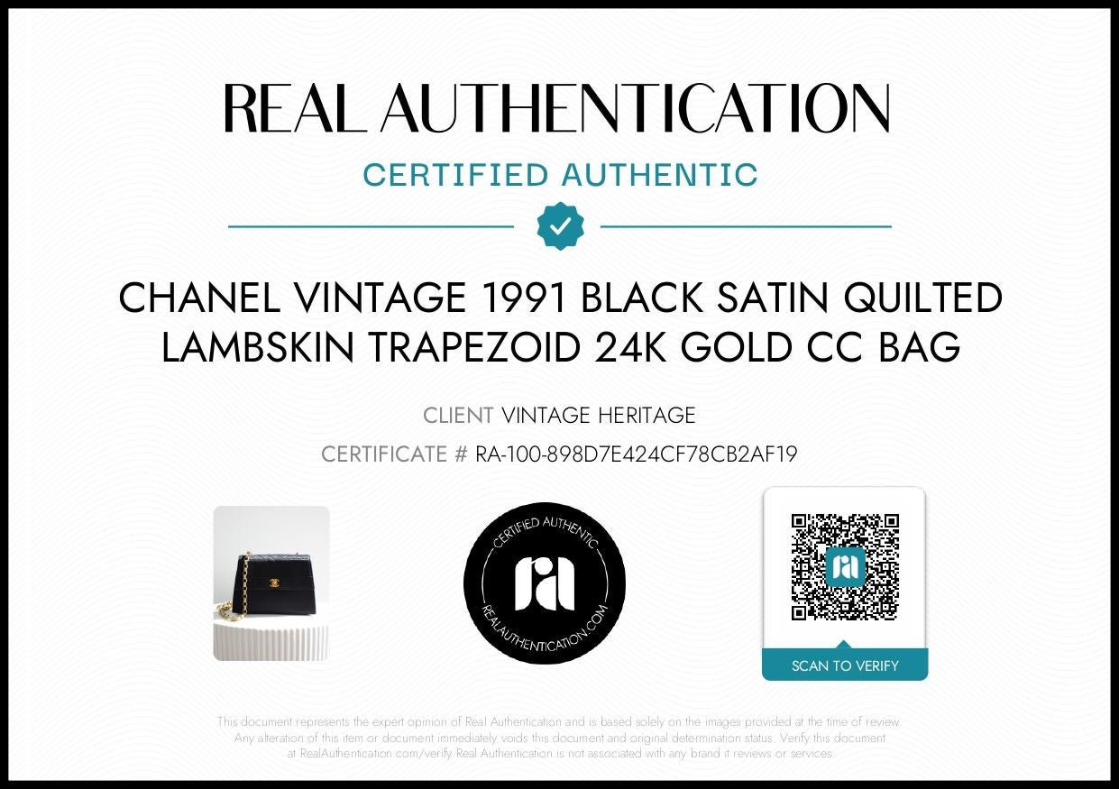 This Chanel Trapezoid bag is a rare and exquisite vintage piece from Series 1, made between 1989 and 1991. Crafted from black diamond-quilted satin, it features the iconic Chanel CC turnlock in 24K gold-plated metal on the front. The bag is