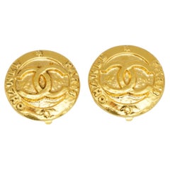 Chanel Vintage 1991 Logo Coco CC Paris Circle Round Button Stars Clip Earrings