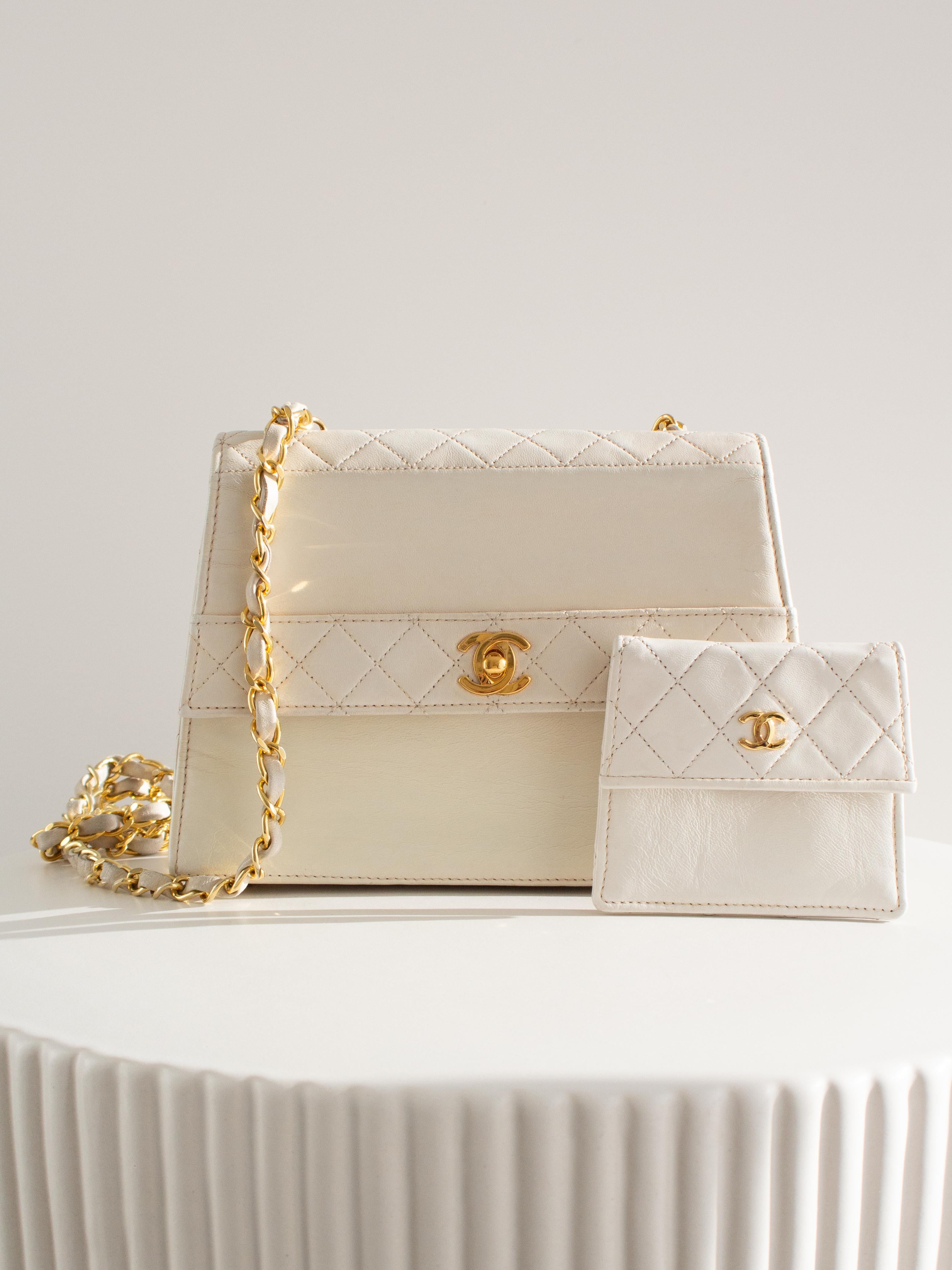 This Chanel Trapezoid bag is a rare and exquisite vintage piece from Series 1, made between 1989 and 1991. Crafted from soft diamond-quilted lambskin leather, it features the iconic Chanel CC turnlock in 24K gold-plated metal on the front.
What