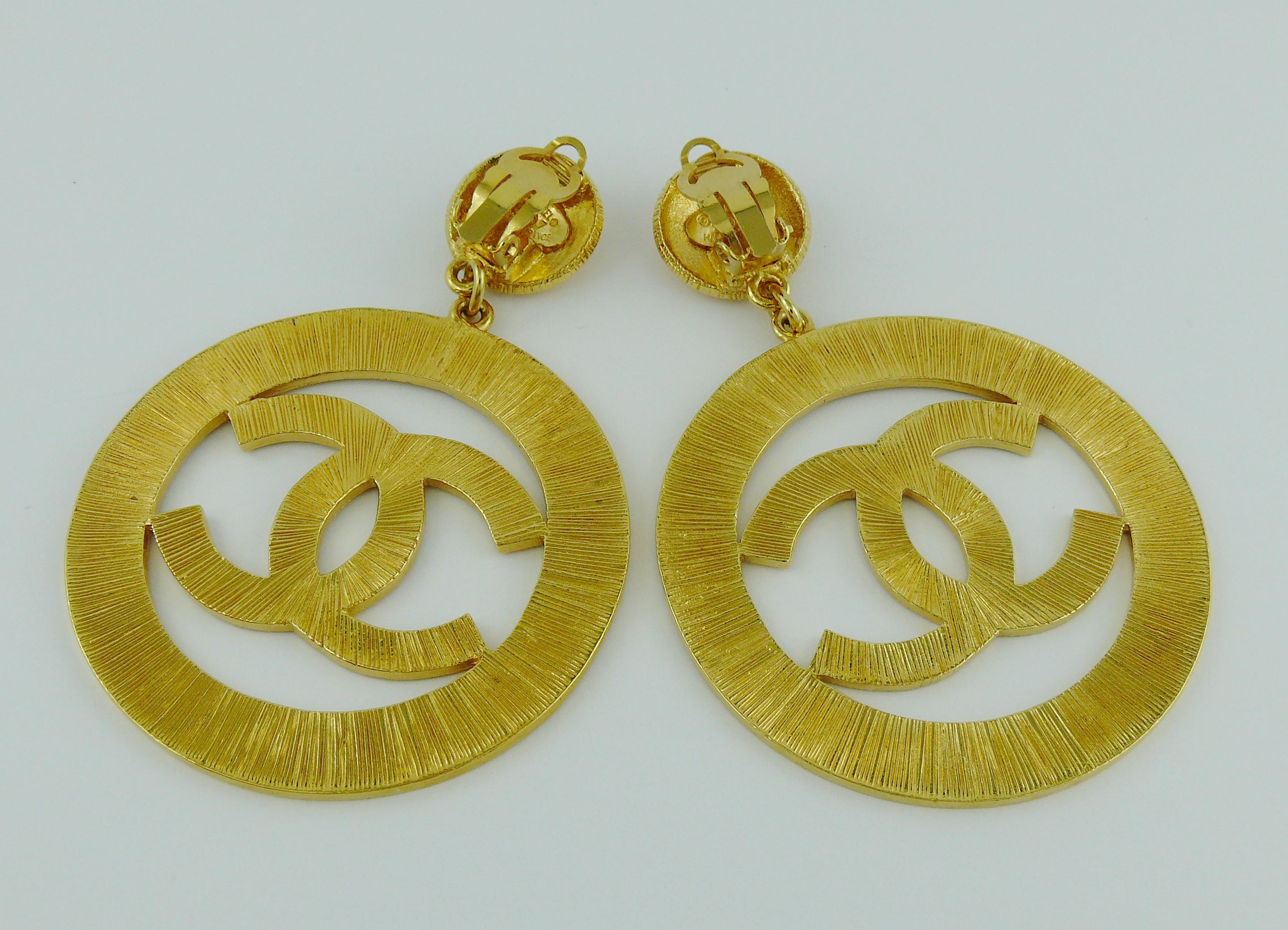 Chanel Vintage 1992 Gold Toned Jumbo Sunburst Textured CC Logo Dangling Earrings 1