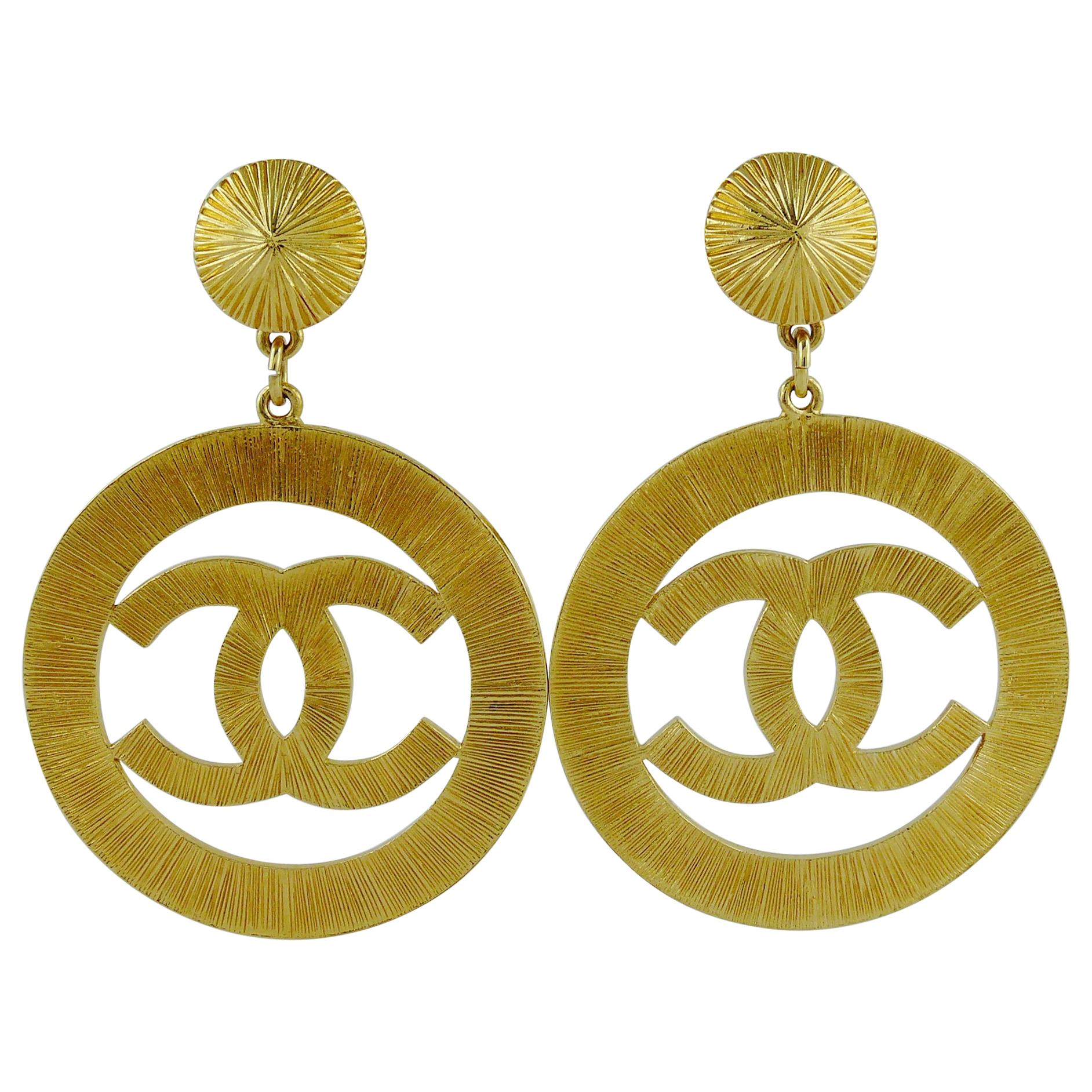 Chanel Vintage 1992 Gold Toned Jumbo Sunburst Textured CC Logo Dangling  Earrings