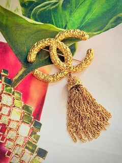 Chanel Vintage 1993 Iconic Gold Lava Logo Coco CC Tassel Fringe Chunky Brooch