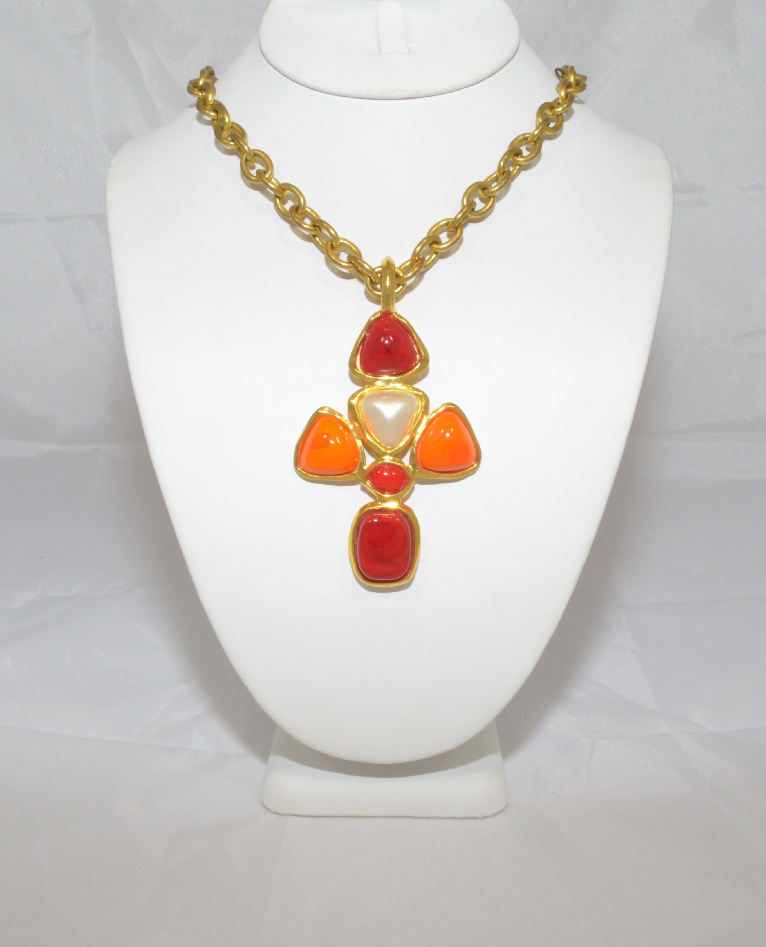 Vintage Chanel necklace from the 1993 P collection on a gold-tone chain with a red, orange, and white gripoix pendant. Excellent vintage condition.

Measurements:
Length - 28''
Drop - 14''
Length of pendant - 3.5''