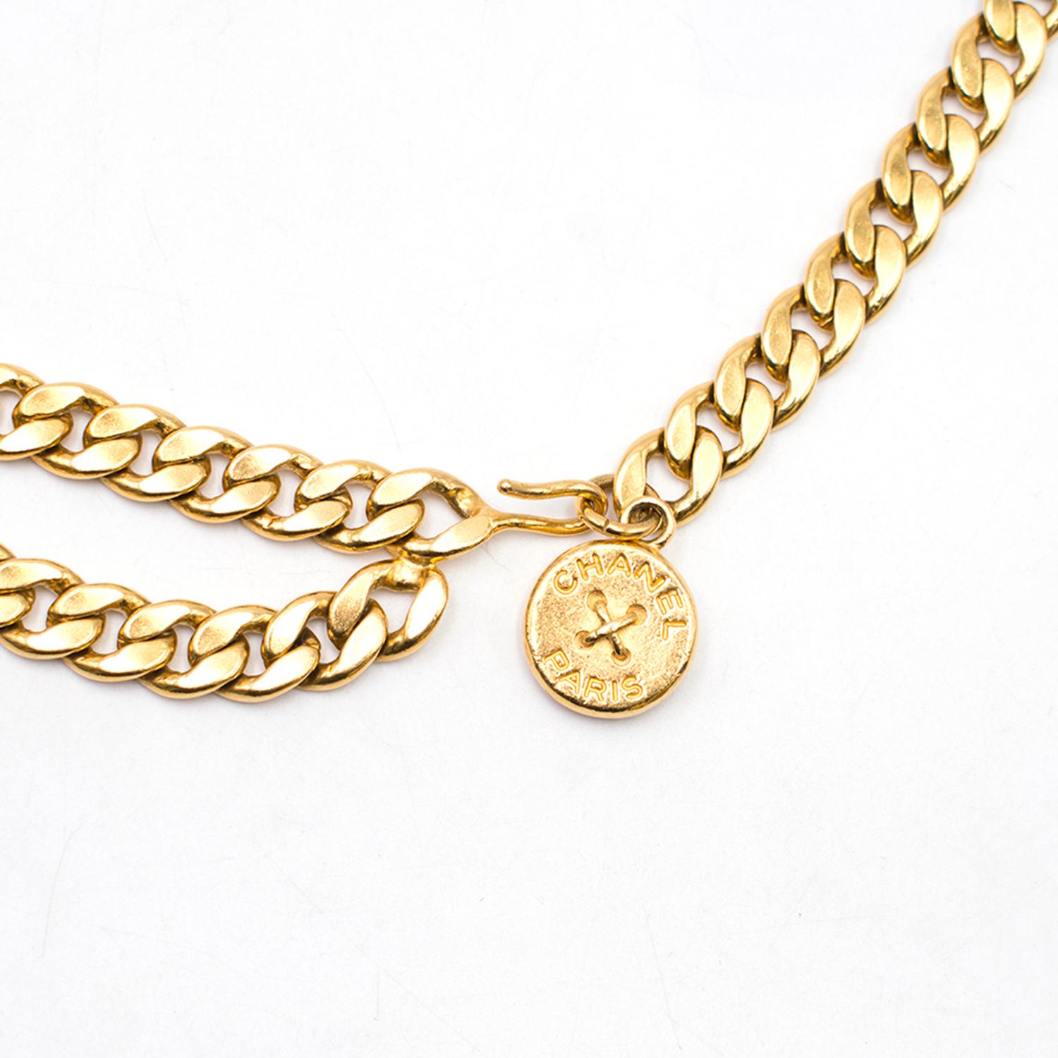 Chanel Vintage 1994 Gold-plated Chain Belt & Necklace

- Yellow gold-plated chunky chain
- Can be worn as both a belt or a necklace (Please see all images)
- Hook closure
- Coin style Chanel branded charm
- Rare & vintage collectors piece from 1994