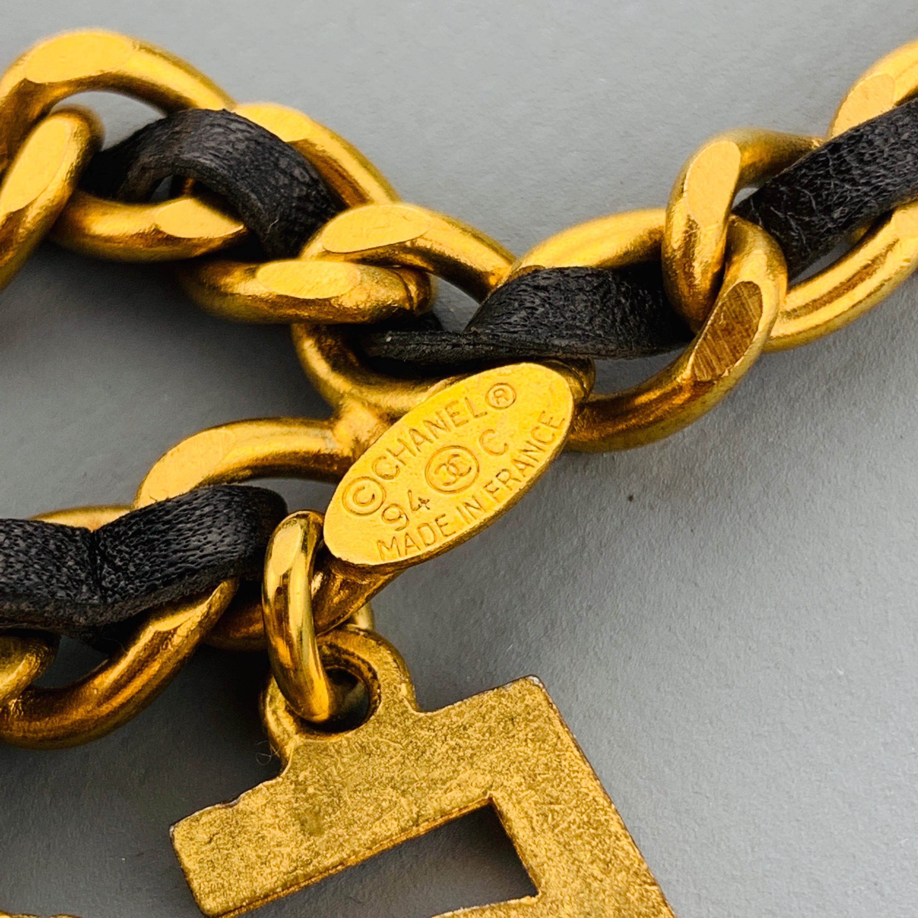CHANEL Vintage 1994 Gold Tone Metal Black Leather Woven Chain Charms Belt 6