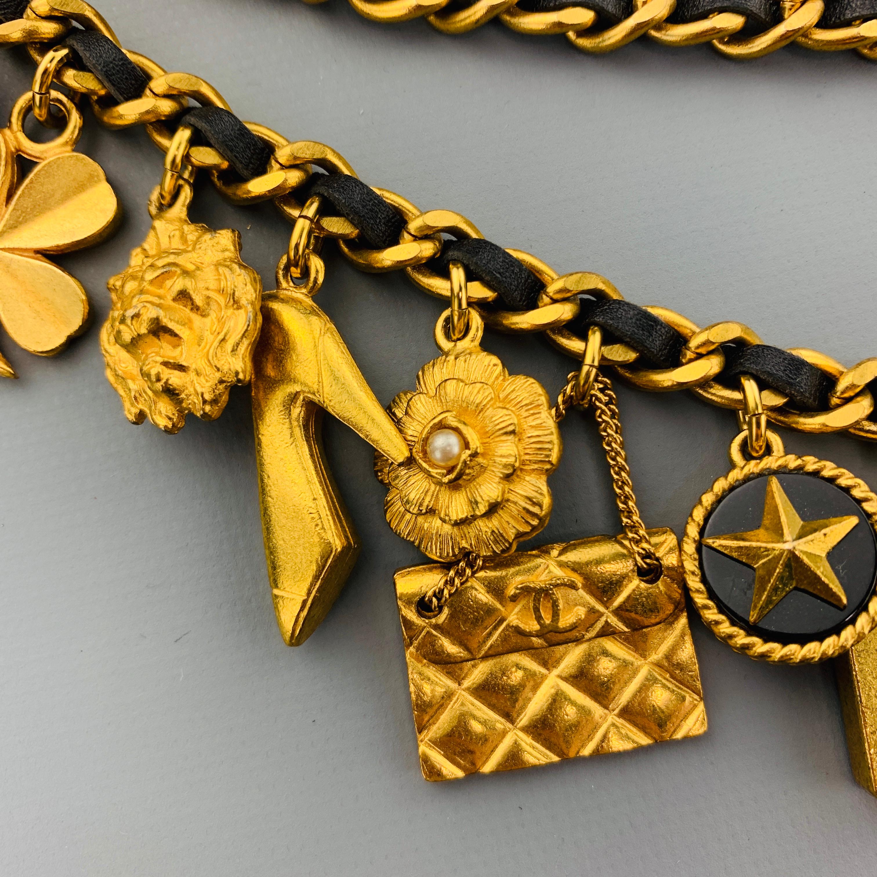 Orange CHANEL Vintage 1994 Gold Tone Metal Black Leather Woven Chain Charms Belt