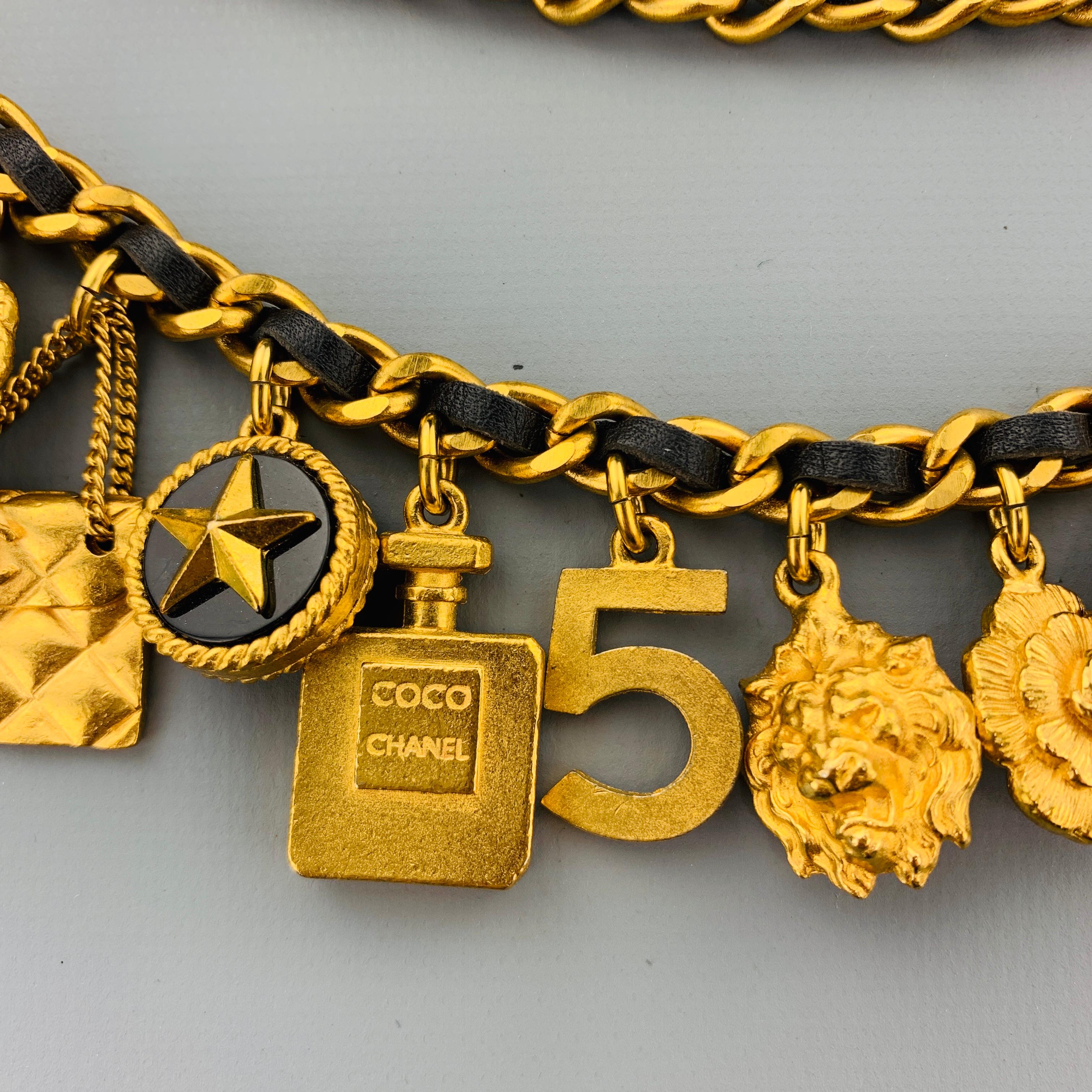 CHANEL Vintage 1994 Gold Tone Metal Black Leather Woven Chain Charms Belt In Excellent Condition In San Francisco, CA