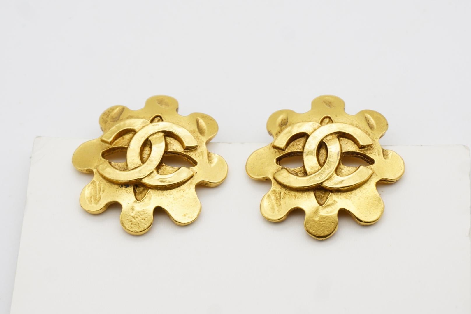 Chanel Vintage 1994 Textured Logo CC Coco Engraved Flower Openwork Earrings For Sale 5