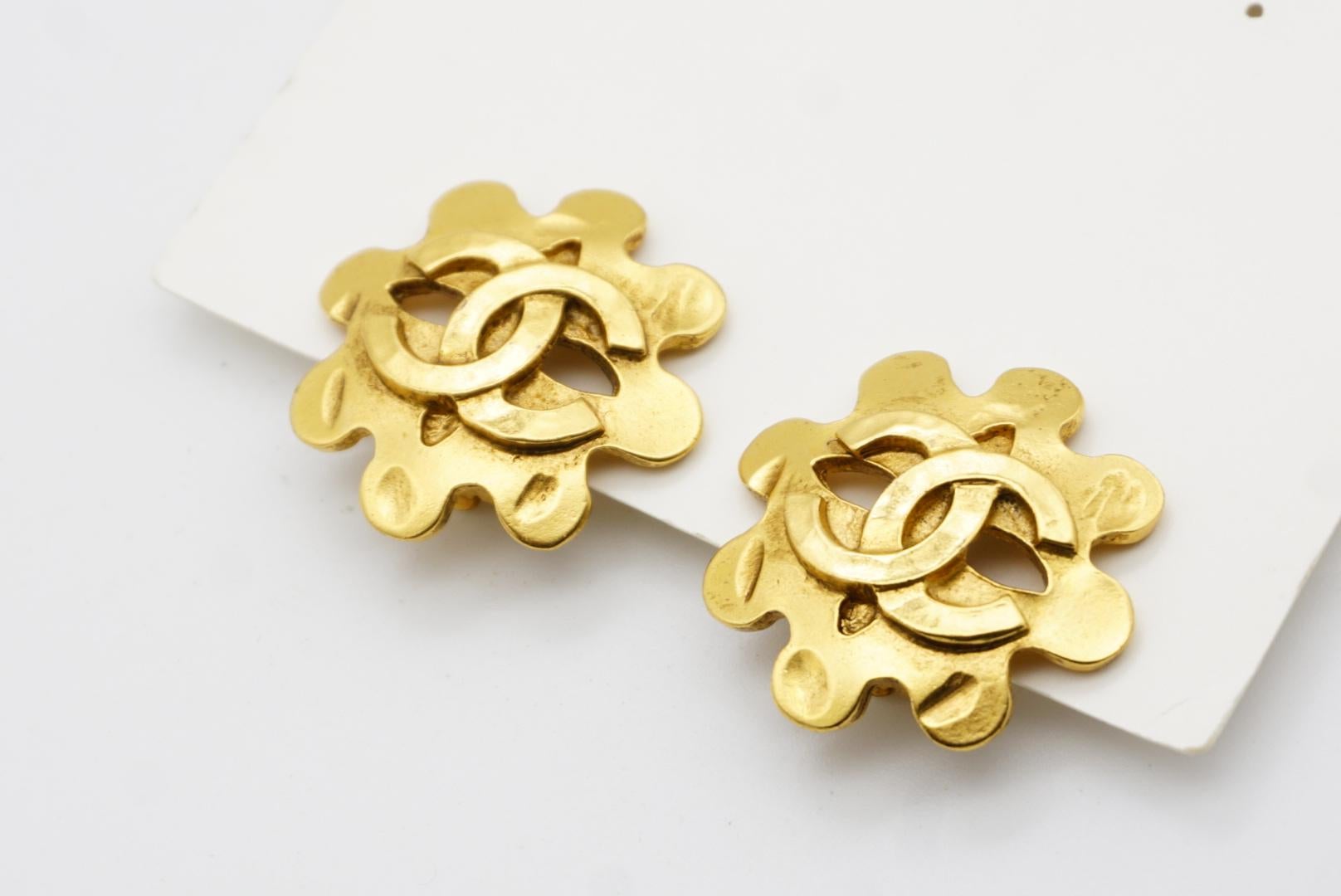 Chanel Vintage 1994 Textured Logo CC Coco Engraved Flower Openwork Earrings For Sale 3