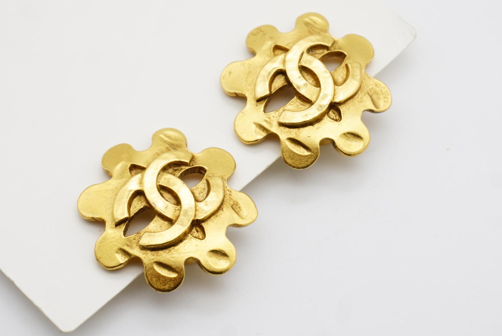 Chanel Vintage 1994 Textured Logo CC Coco Engraved Flower Openwork Earrings For Sale 4