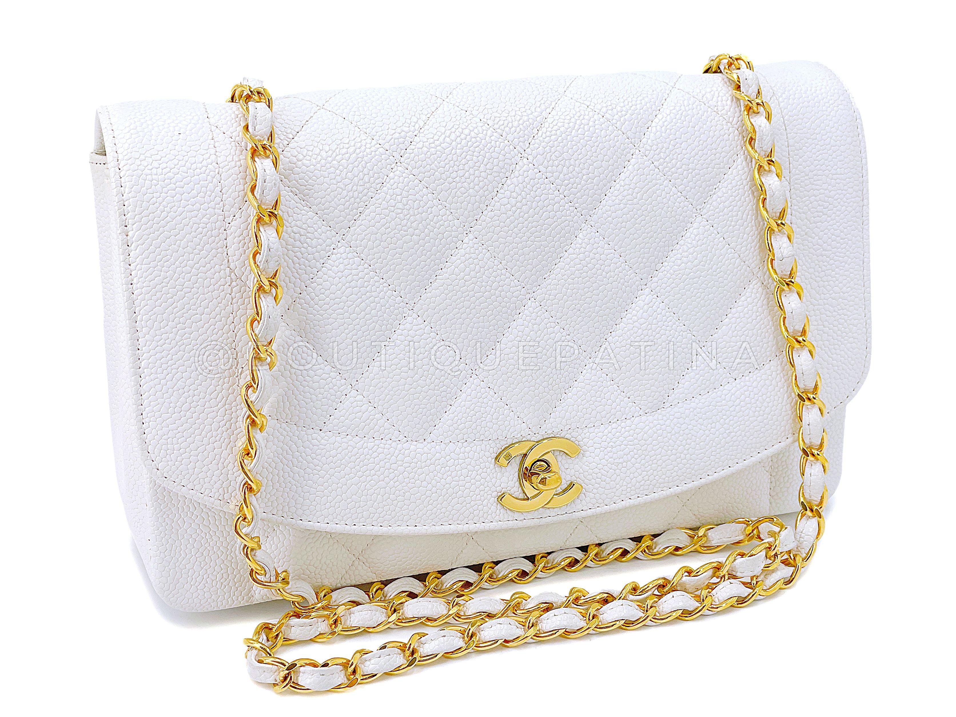 Store item: 67764
We love vintage white caviar on 24k gold plated hardware - and this Chanel Vintage 1994 White Caviar Medium Diana Flap Bag 24k GHW is no exception. The combination of the pebbled calfskin with the 24k gold plated hardware is a holy