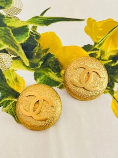 Chanel Vintage 1995 Texture Coco Logo CC Circle Round Relief Medallion Earrings