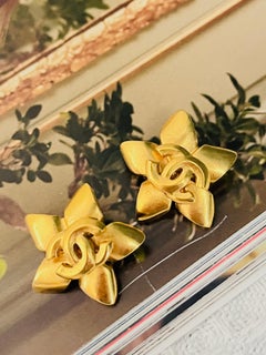 Chanel Vintage 1996 Logo CC Coco Flower Blossom Pentagram Star Clip Earrings