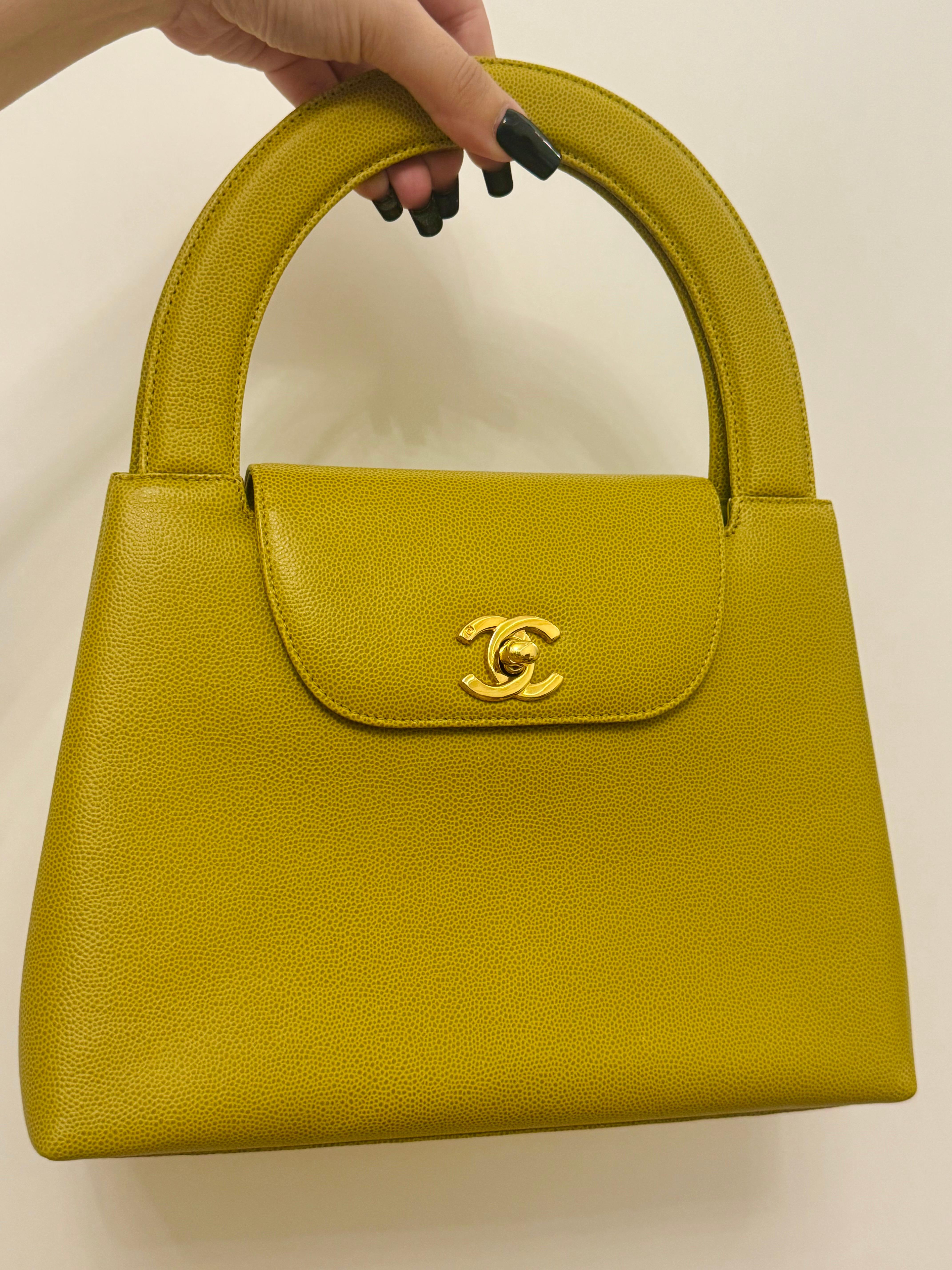 Rare Chanel 1997-1999 (5 series) lemon green (Citron vert) caviar leather Kelly Top Handle bag, no more serial number inside but it comes with the original authenticity card and booklet. Very good condition, 24k gold plated hardware. 10 x 11.5