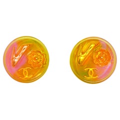 Chanel Vintage 1997 Orange Aurora Logo CC Camellia Heels Round Clip Earrings