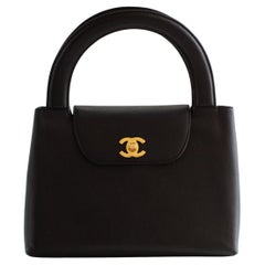 Chanel Vintage 1998 Kelly Black Caviar Leather 24K Gold Top Handle Bag