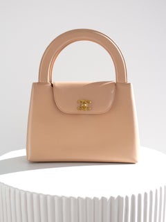 Chanel Vintage 1998 Kelly Borsa a manico superiore in pelle d'agnello rosa nuda e oro 24 carati