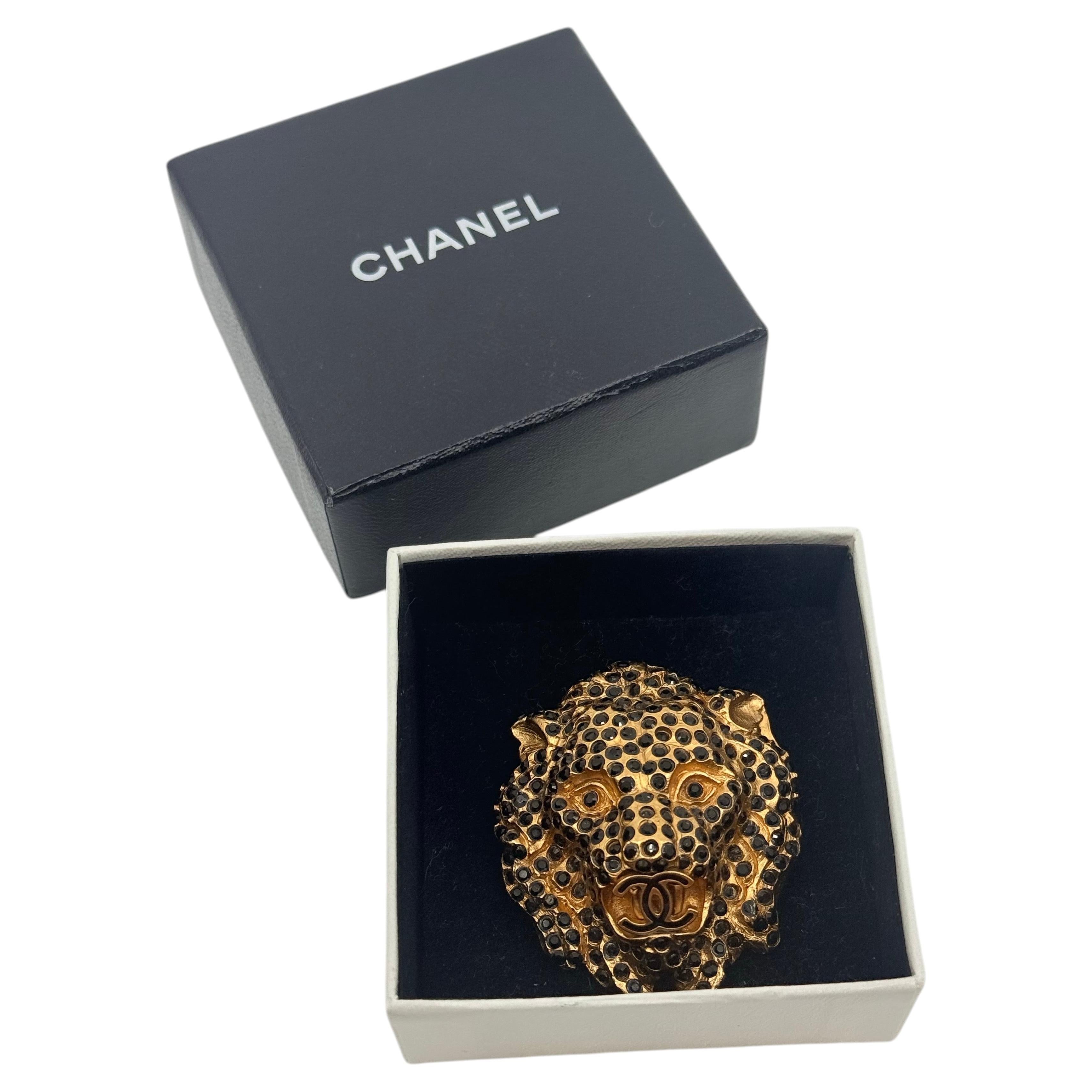 How do I authenticate a Chanel brooch?