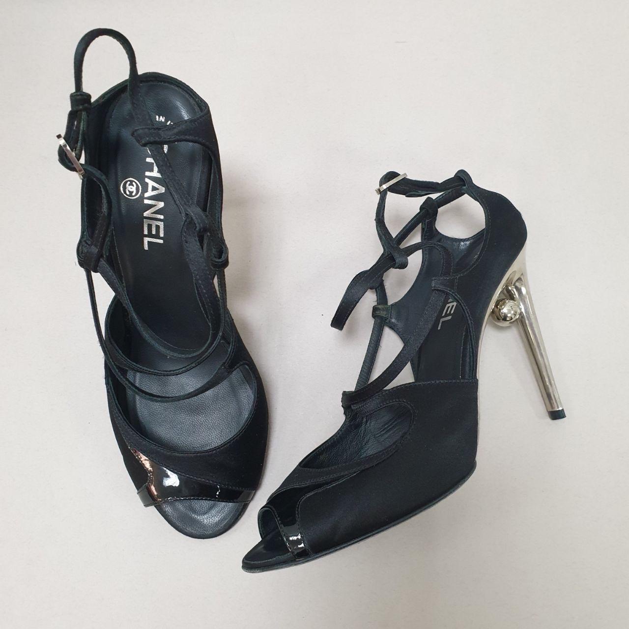     Chanel Vintage Slingback Sandals
    From the Fall 2008 Collection by Karl Lagerfeld
    Black Satin
    Interlocking CC Logo & Faux Pearl Accents
    Beaded Accents
    Multistrap & Buckle Closure at Ankles


Very good condition. Signs of wear