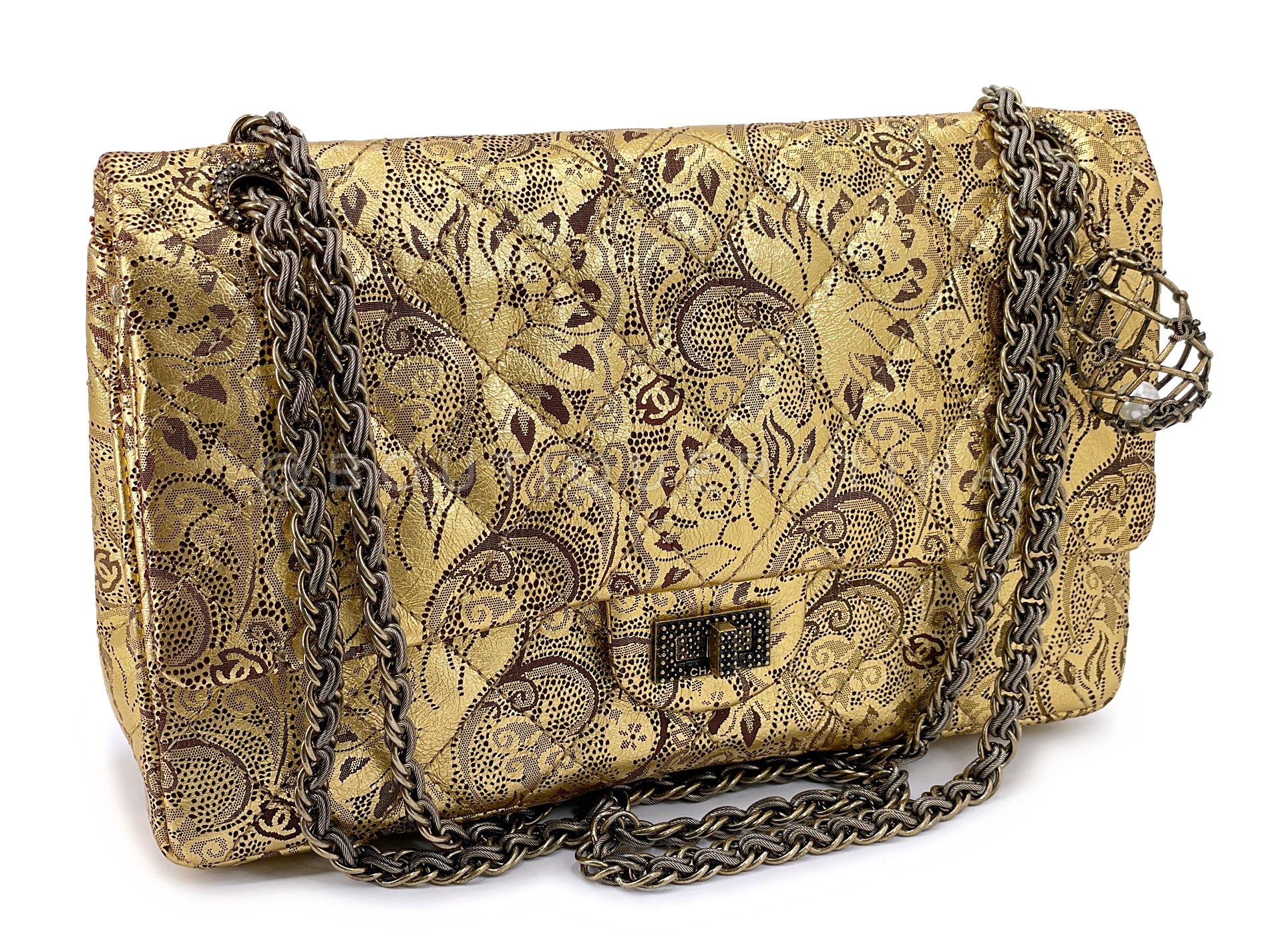 Store item: 68448
This Chanel Vintage 2009 Paris-Moscou Gold Brocade 2.55 Reissue Flap Bag 226 Medium Moscow is a show stopper piece with the most intricate details. From the 2009 Paris Moscow Metiers d'Art Collection, this bag is a collector's