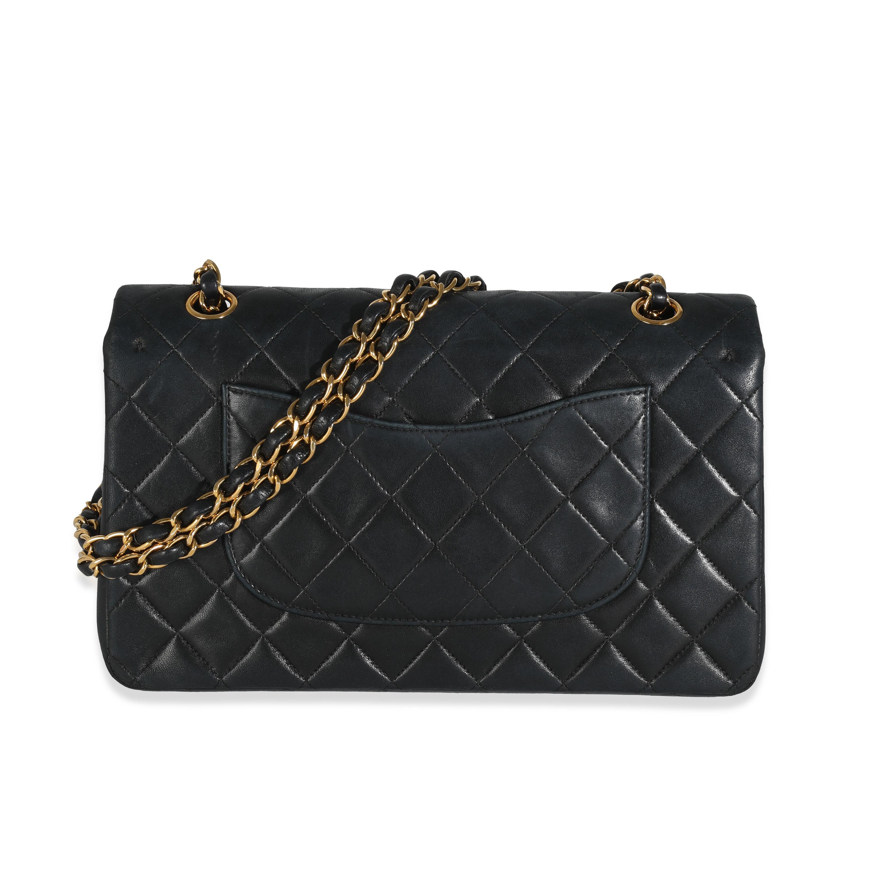 Listing Title: Chanel Vintage 24K Black Quilted Lambskin Medium Classic Double Flap Bag
SKU: 144290
Condition: Pre-owned 
Condition Description: A timeless classic that never goes out of style, the flap bag from Chanel dates back to 1955 and has