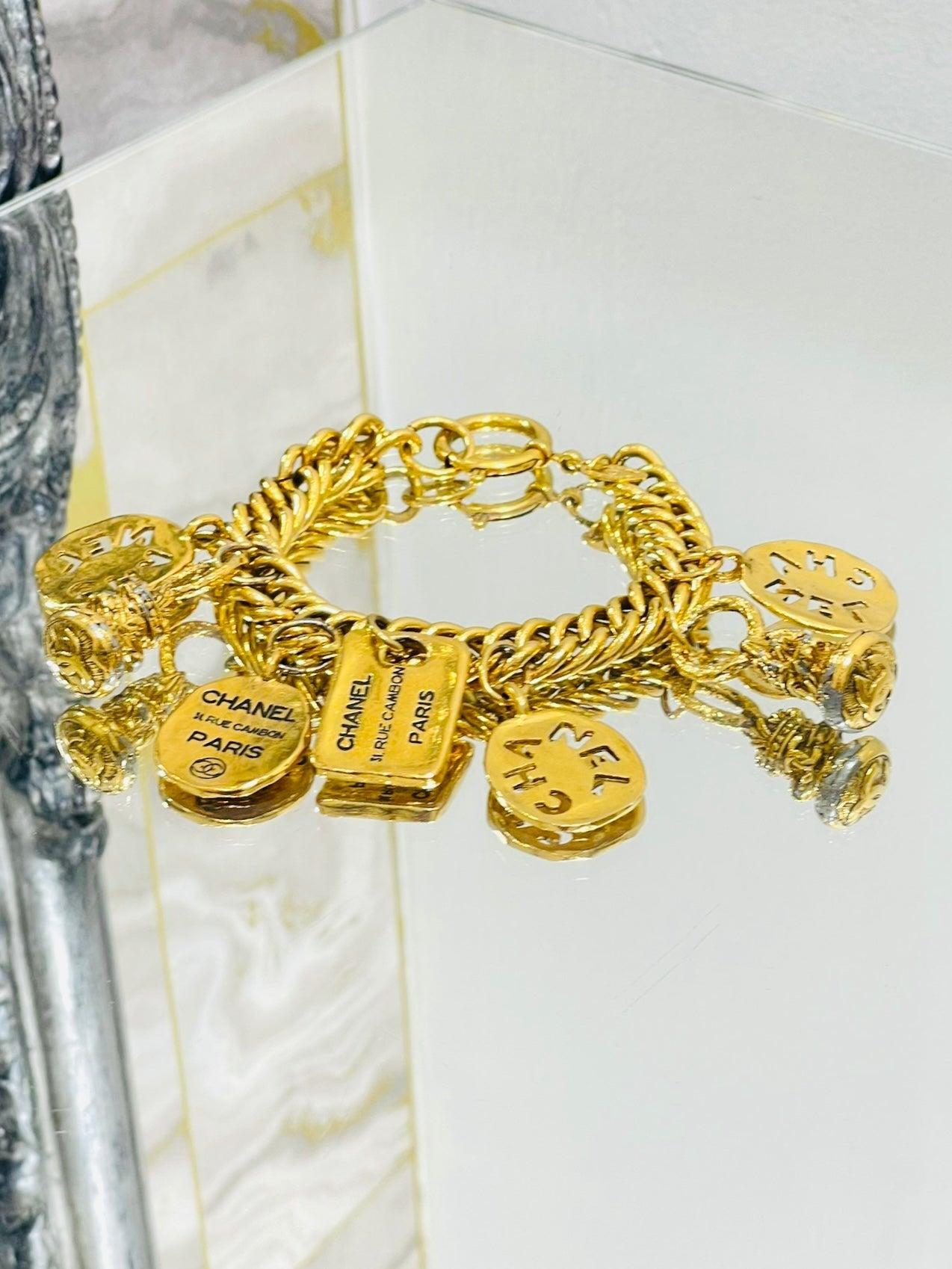Chanel Vintage 24k Gold Plated Charm Bracelet

Large link bracelet with Fob logo charms and 'Chanel Rue' cut out plaques. From the 1980's. 

Additional information:
Size – One Size
Composition- Metal, 24k Gold Plate
Condition – Vintage - Good (Some