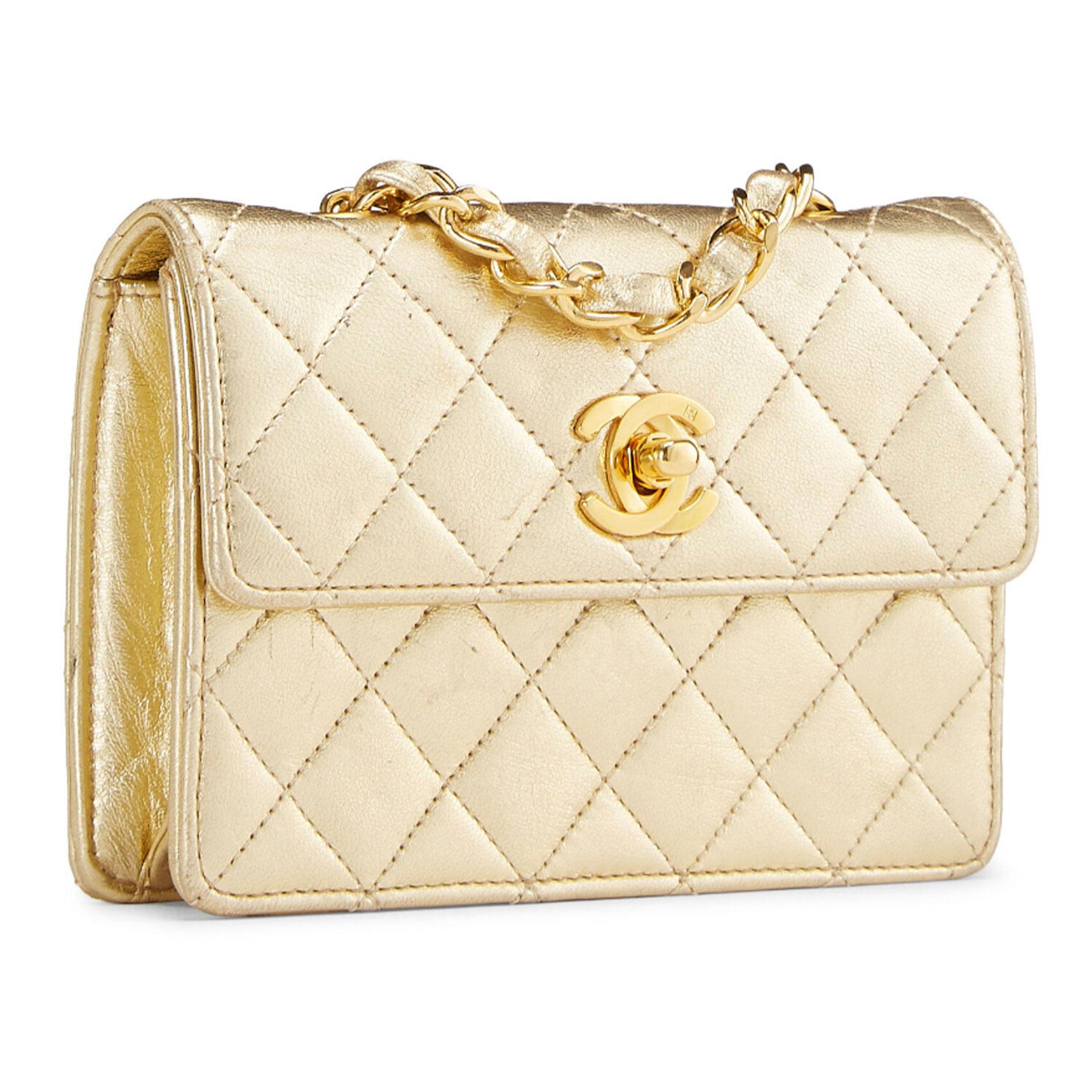 Chanel Vintage 80's Micro Mini Metallic Gold Quilted Lambskin Flap Bag

Chain-link And Leather Strap
CC Turnlock Closure
Lambskin Leather
Leather Lining
Gold Hardware

Made in France