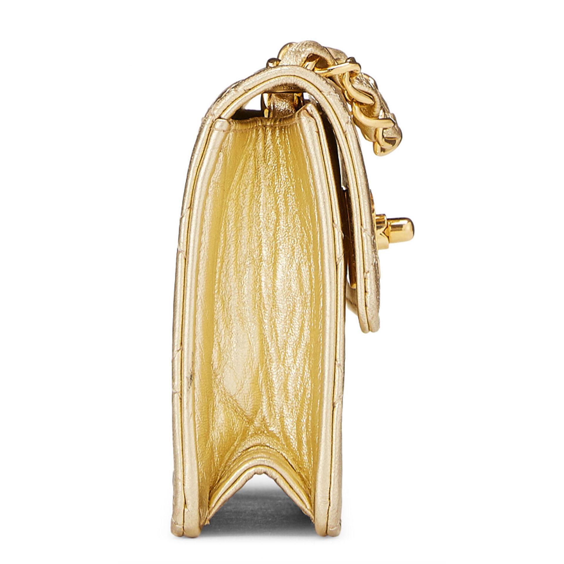 gold chanel purse