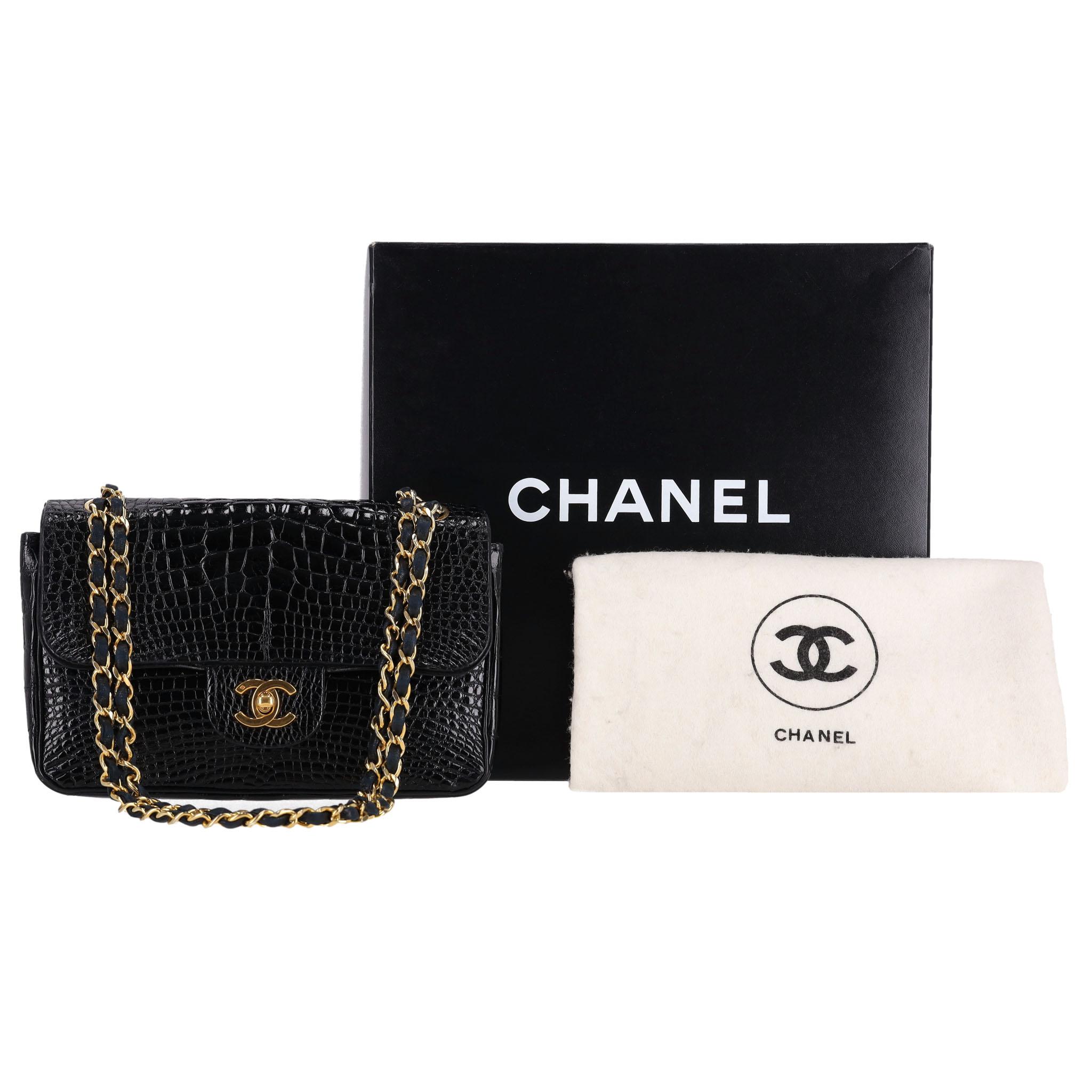 Investment Piece - Chanel Vintage 80's Shiny Crocodile Skin Small Timeless Double Flap Bag

Shiny black iconic handbag crafted in Crocodile skin with 24k gold plated hardware.

Featuring front double flap with signature 'CC' stitching to the
