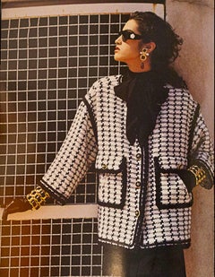 CHANEL Vintage '86 Armreif aus schwarzem Leder mit gewebten Goldkettengliedern