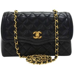 Chanel Vintage 9" Black quilted Curved Flap Shoulder Bag