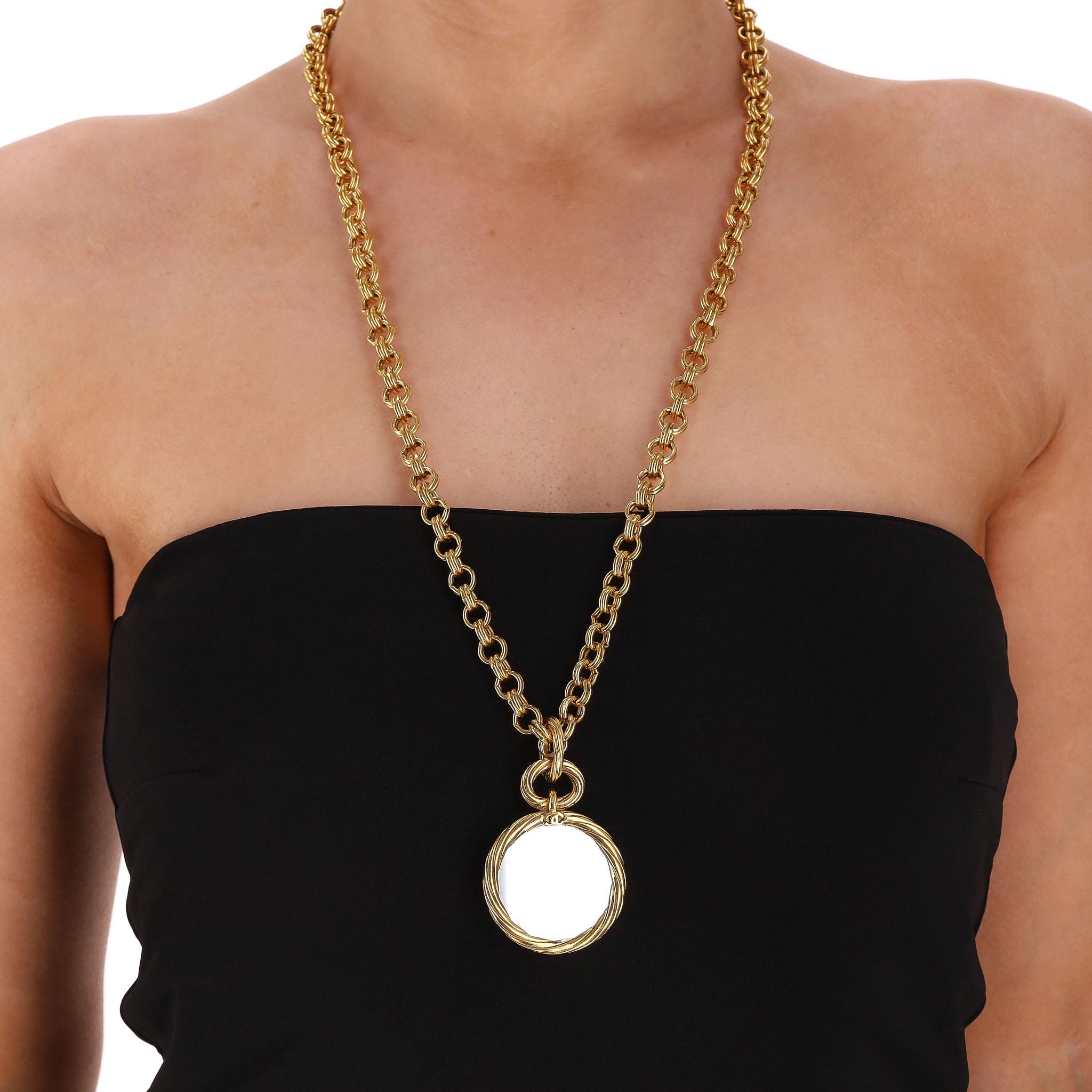 Collectors Item - Chanel Vintage 90's 24k Gold Plated 'CC' Logo Medallion & Mirror Double-Sided Necklace 

From Spring 1993 Collection is this very rare chain necklace crafted from 24k gold plated metal with a round medallion pendant detailed with a